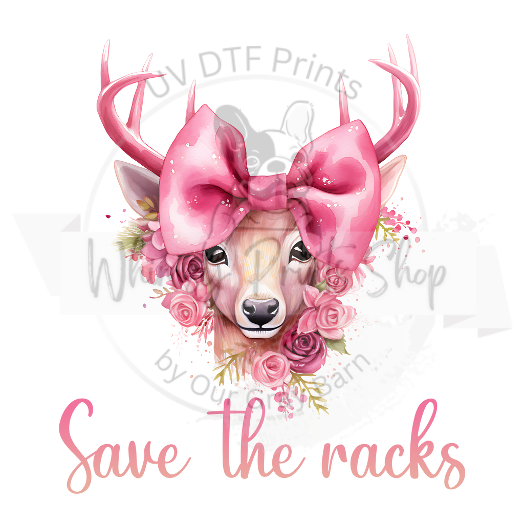 a pink deer with a pink bow on it's head