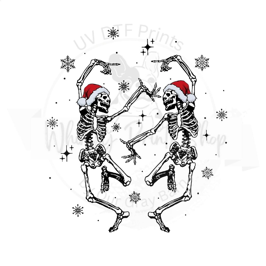 a couple of skeletons in santa hats dancing