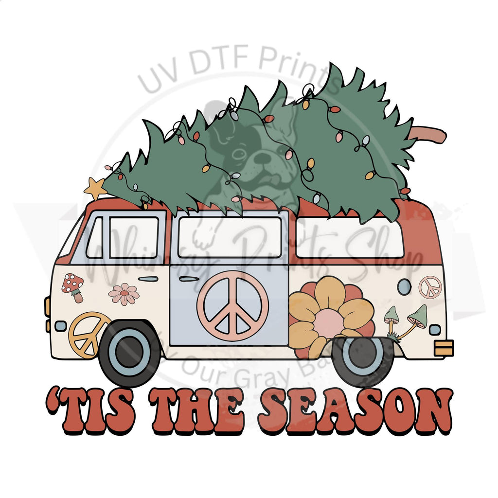 a vw bus with a christmas tree on top